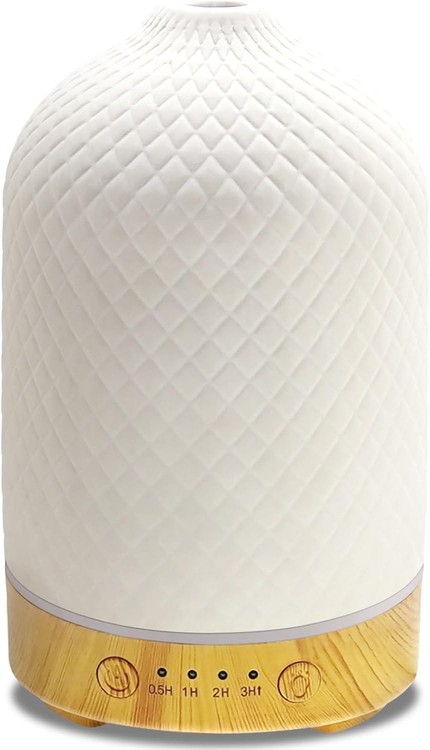 Ceramic essential oil diffuser with soft white light on